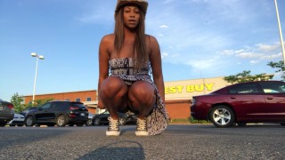 Peeing at crowded Best Buy parking lot.