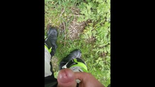 Cumshot in the forest during a motorcycle ride