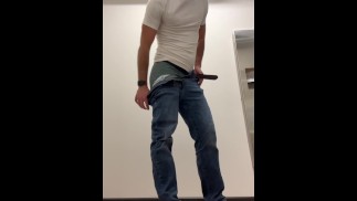 Pissing in a condom and pouring it on my face in public restroom - Slow motion