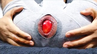 Anal fingering and apple insertion close-up