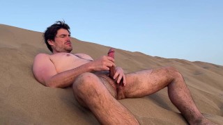 jerking off on a public nude beach while a friend filming me