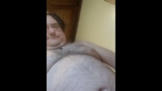 Sean piss teases with a paper cup