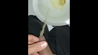 Desperate young man pissing, morning erection, close-up