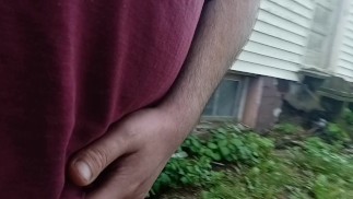 Sean walkin around yard n pisses