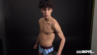 Curly twink boy shows off his slim body on webcam